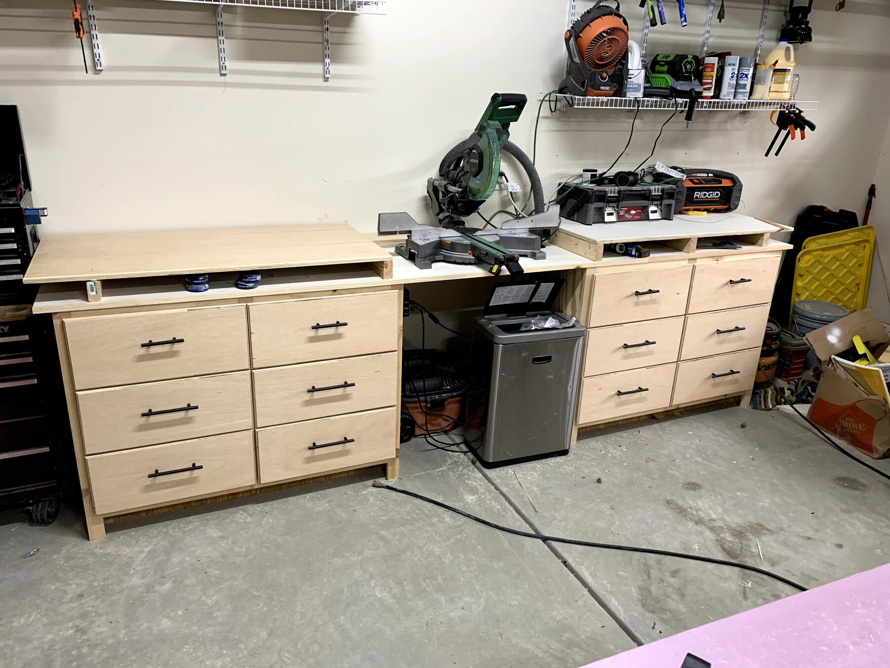 Shop-built maple garage workbench with two banks of full-extension drawers under a solid work surface